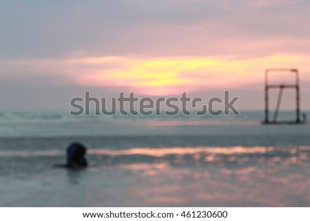 Blur Image - Boy and couple on the sunset beach