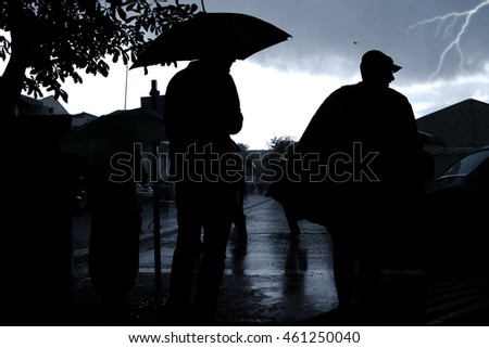 People waiting for something in Rainy Weather