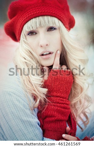 incredible blonde posing for the photographer in winter