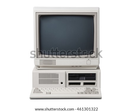 Old personal computer isolated on white background.