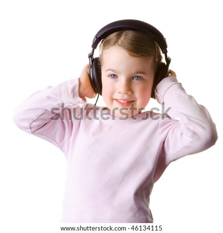 Full isolated studio picture from a little girl listen to the music