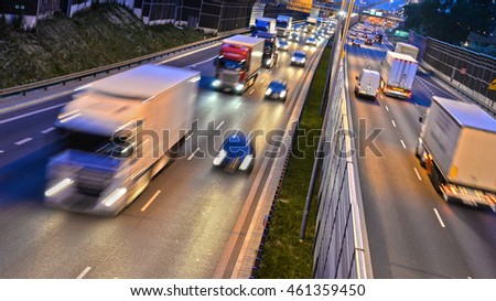 Six lane controlled-access highway in Poland by night.
 Royalty-Free Stock Photo #461359450