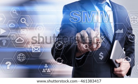 Businessman is pressing on the virtual screen and selecting "SMM".