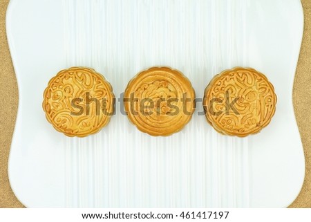 Close up view of Chinese moon cake on white dish for celebrate in Mid autumn festival. (Moon cake day) Above angle.