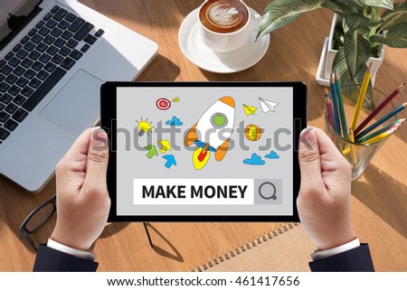 MAKE MONEY Businessman work  on tablet on screen