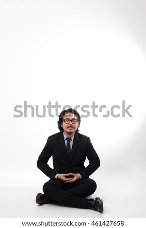 The Asian businessman on the white background.