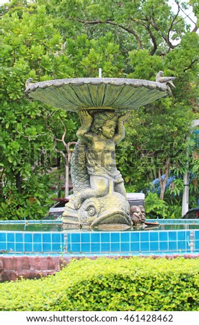 Vintage courtyard fountain in the public park