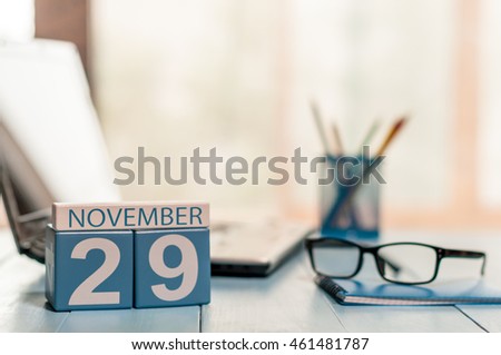 November 29th. Day 29 of month, calendar on editor workspace background. Autumn time. Empty space for text