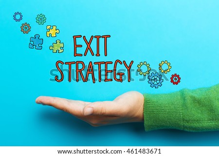 Exit Strategy concept with hand on blue background