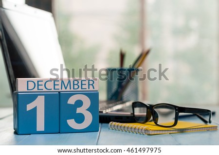 December 13th. Day 13 of month, calendar on designer workplace background. Winter time. Empty space for text