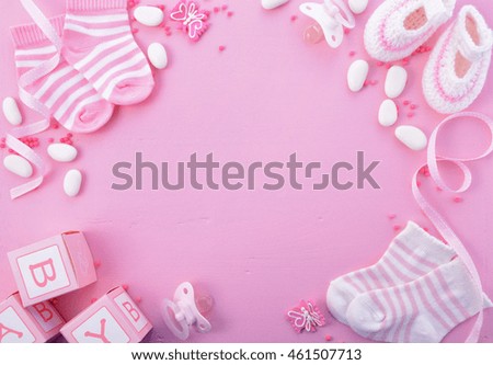 Its a Girl pink theme Baby Shower or Nursery background with decorated borders on pink wood background. Royalty-Free Stock Photo #461507713
