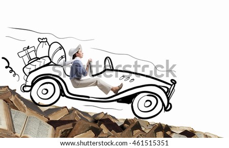 Woman driving old styled drawn car . Mixed media