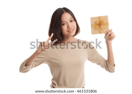 Asian business woman show victory sign with a gift box  isolated on white background .