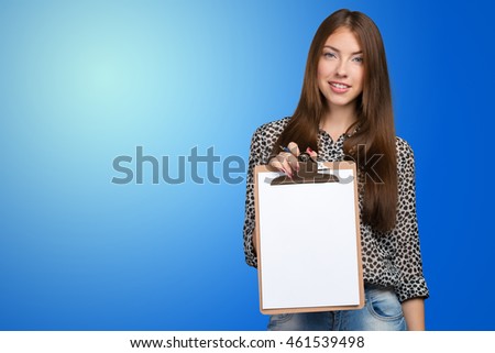 Happy smiling beautiful young woman with clipboard