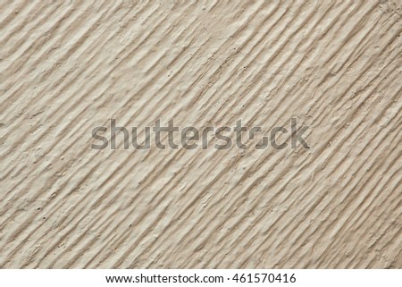 The texture of the material used for flooring around swimming pools.