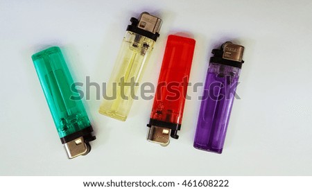 Colorful Thailand lighters on white background.