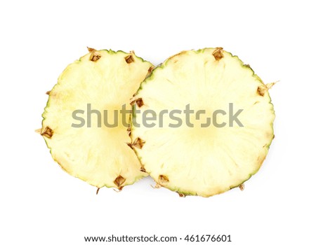 Two pineapple cross-section slices isolated over the white background