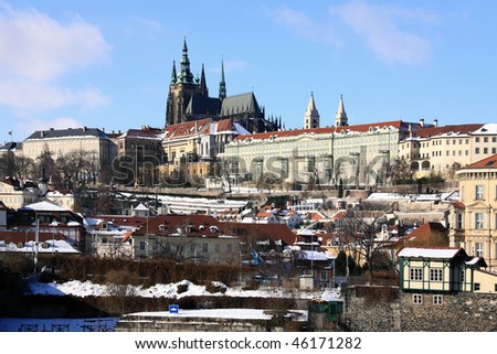 Snowy Prague gothic Castle on the River Vltava with Charles Bridge