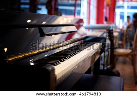 Piano keyboard background with selective focus. old tone.