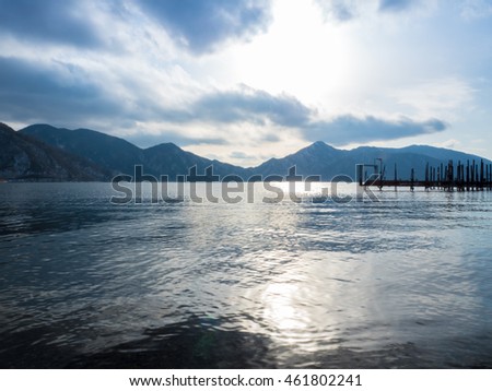 Lake Chuzenji, backlit of wood bridge and mountain, sunlight and cloud, Nikko, Japan