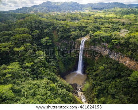 Aerial top view perspective of Chamarel Waterfall in the tropical island jungle of Mauritius Royalty-Free Stock Photo #461824153