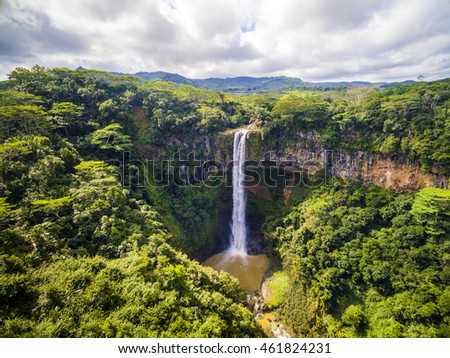 Aerial top view perspective of Chamarel Waterfall in the tropical island jungle of Mauritius Royalty-Free Stock Photo #461824231
