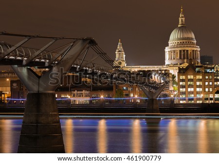 Image showing Millennium Bridge spanning Thames River, London, England.  Nighttime scene with St Paul's Cathedral in the background on North bank.
