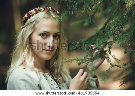young blonde girl poses for the photographer