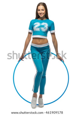 Young sporty woman with hoop isolated