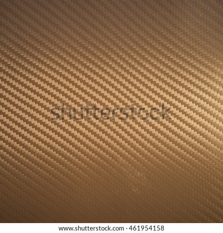 Brown carbon texture. Spotlighted wallpaper. Background