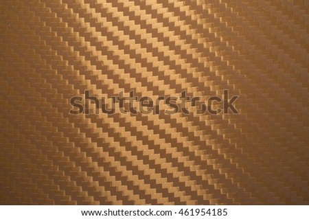 Brown carbon texture. Spotlighted wallpaper. Background