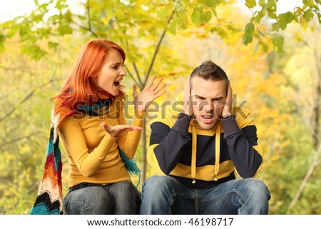 Young pair quarrel in park Royalty-Free Stock Photo #46198717
