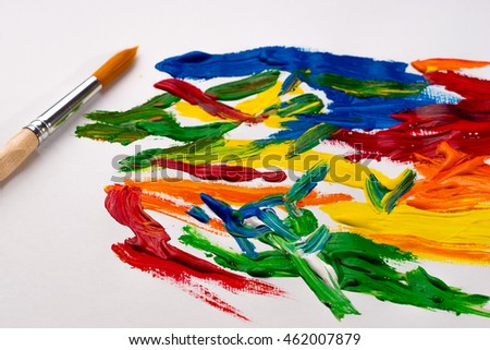 Paints And Brushes On White Background Used For Creating Abstract Art