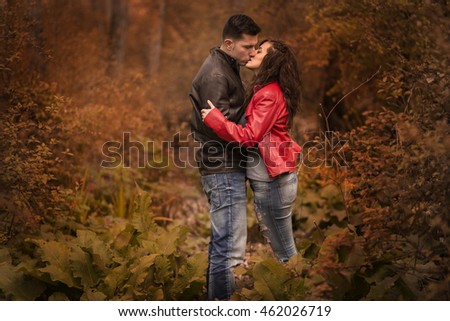 couple kissing outdoor in the park, Autumn