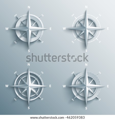 Set of 3d wind roses in paper and origami style. Modern compass and star icon illustration.
