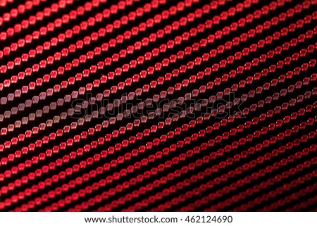 Kevlar abstract red background.