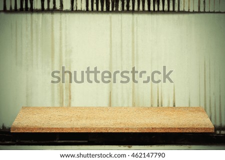 Empty top of natural stone shelves and stone wall background. For product display