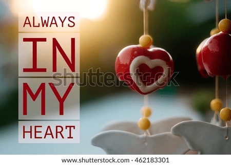 Inspirational Typographic Quote , Red ceramic mobile heart.