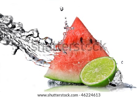 watermelon, lime and water splash isolated on white