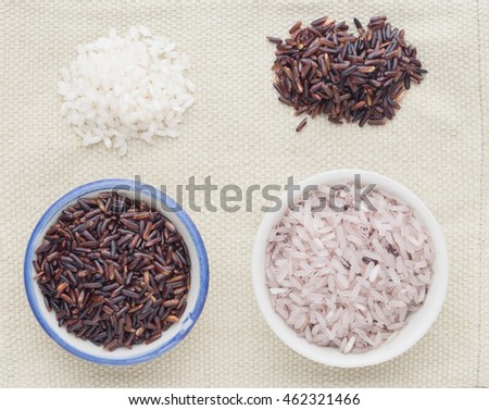 Variety rice in the bowl on sackcloth background with healthy concept
