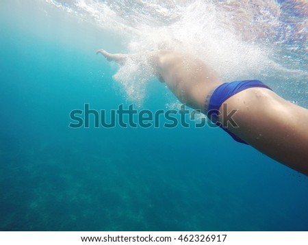 man swim in the sea