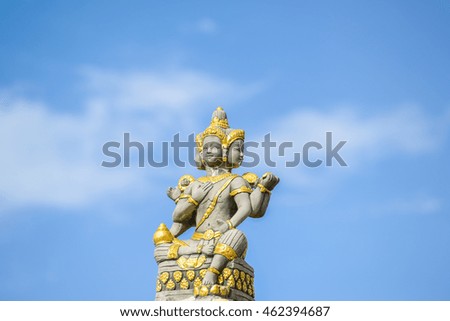Buddha Statue blue sky background  in chiangmai Thailand.