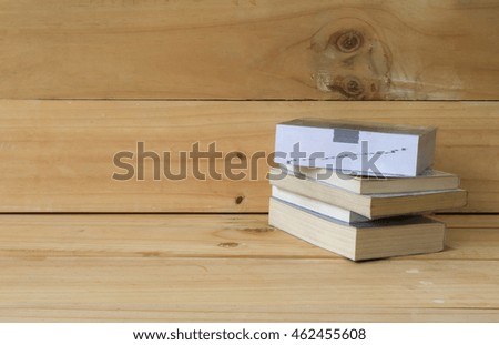 books on brown wooden