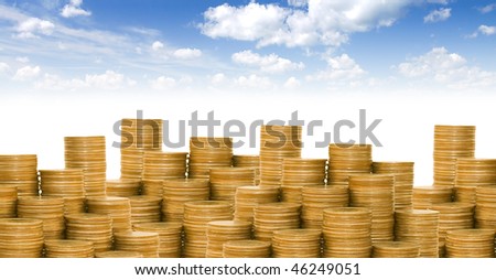 Golden coins against the blue sky