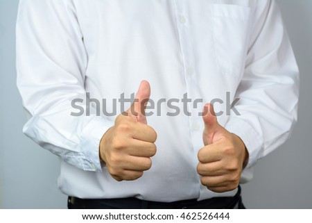 People showing OK sign with his thumb up.