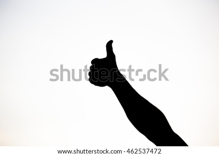 Silhouette of a team of people hands shows gesture ok