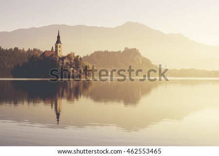 Vintage retro stylized photo of Bled,Lake, island and castle,Slovenia