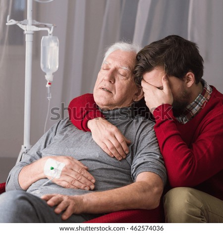 Picture of son suffering after father's death