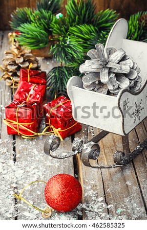 Christmas holiday decorations.Boxes with Christmas gifts,fir tree and pine cone
