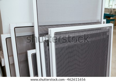 Insect Screens for Windows Manufacturing. PVC Mosquito net  for windows, Doors, Balcony. Netting Against Mosquito Royalty-Free Stock Photo #462611656